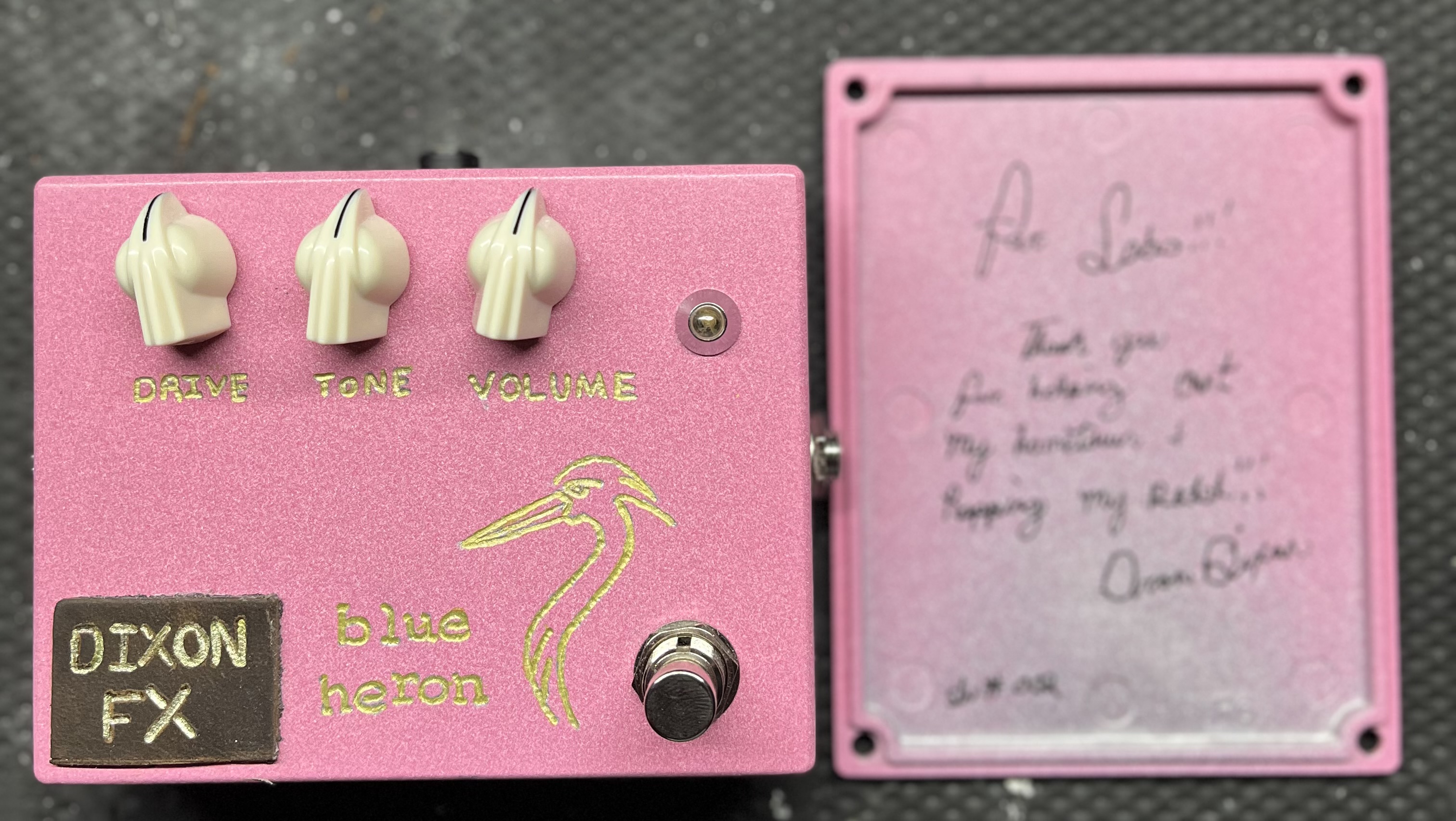 DixonFX pedal beside its backplate, hand-signed with a thank-you note